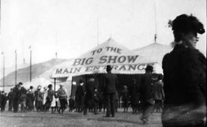 Barnum & Bailey Circus tent with sign, "To the big show, main  entrance," at Broadway and Halsey Street - 1902 (courtesy of Brooklyn Public Library).