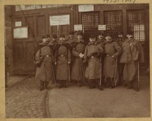 State militiamen posing outside of the car barn during a quiet moment.