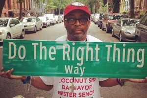 Spike Lee, the director of the movie, "Do The Right Thing," with his proposed sign that would rename Stuyvesant Avenue.