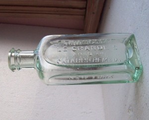 An empty bottle of the type sold by Dr. Lawrence in 1885.