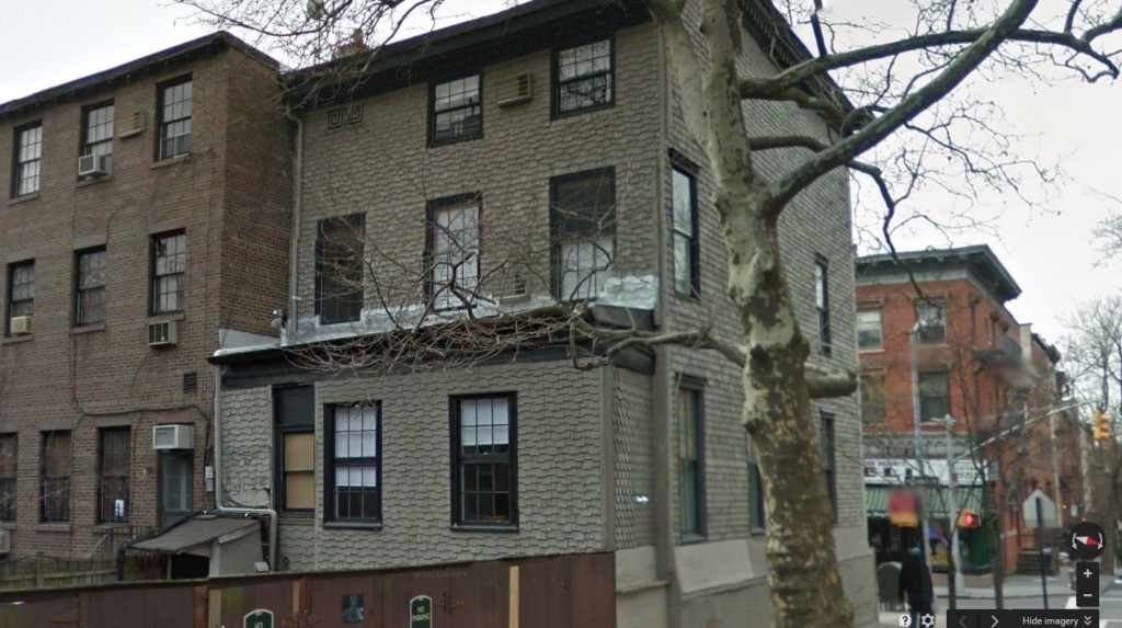 The back of the home at 303 Henry Street, where the "hungry burglars" forced a kitchen window (courtesy Google Maps).